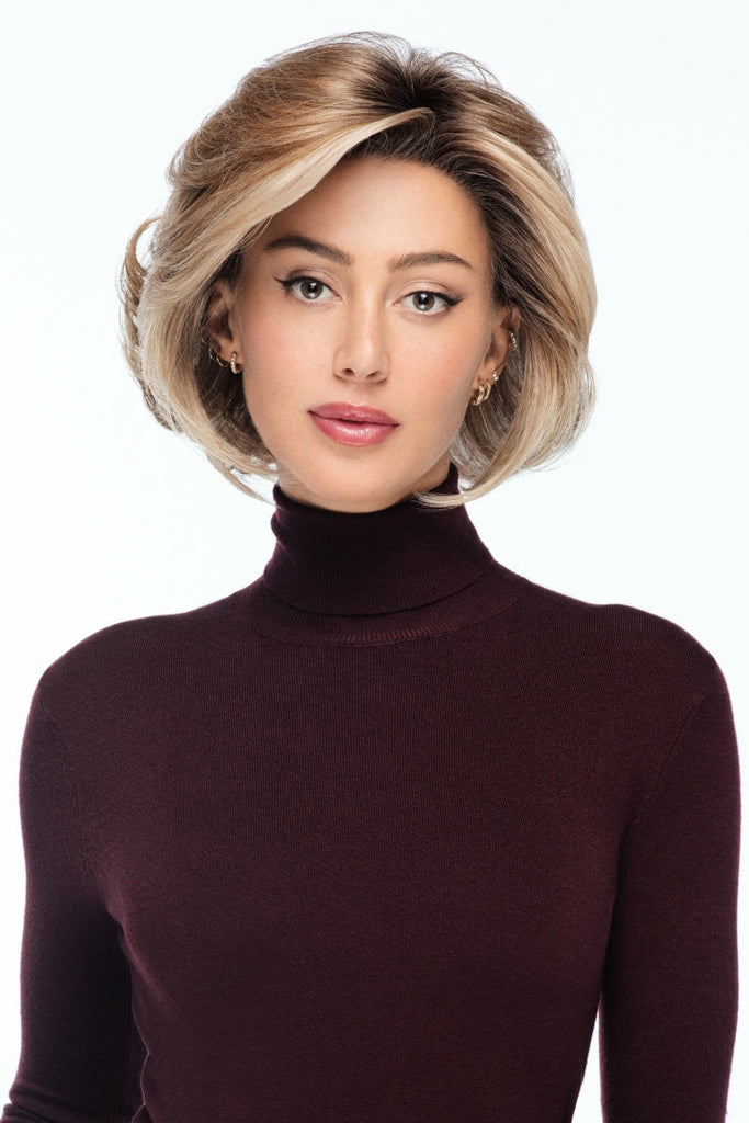 Woman wearing Charlotte Realistic by TressAllure in the color EL12/22/R8.