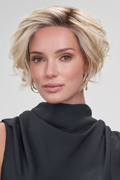 Woman wearing Ignite by Jon Renau, a short a-line wig in a pretty natural blonde.