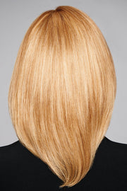 Model wearing Raquel Welch wig Headliner Human Hair 9.