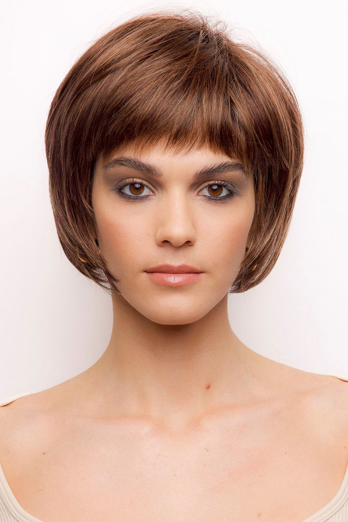 Model wearing the Rene of Paris wig Nell (#2408) 2.